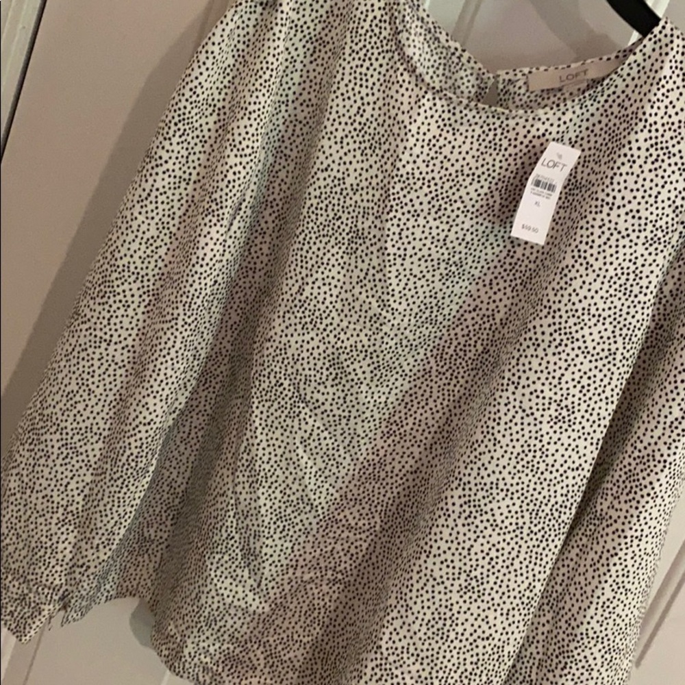 White blouse w black dots